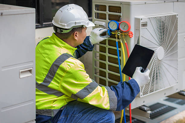 Professional Hvac technician working in Commack, NY